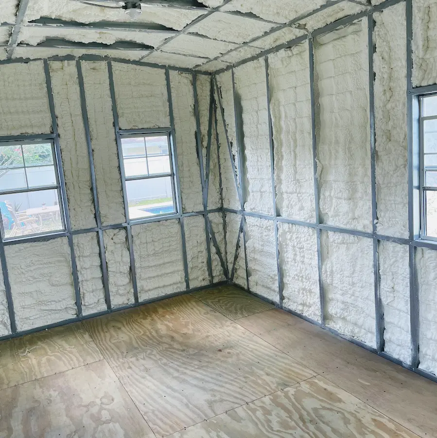 Closed-cell spray foam insulation applied to wall cavities in a residential project in Yuma